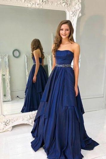 dark blue dress with silver shoes
